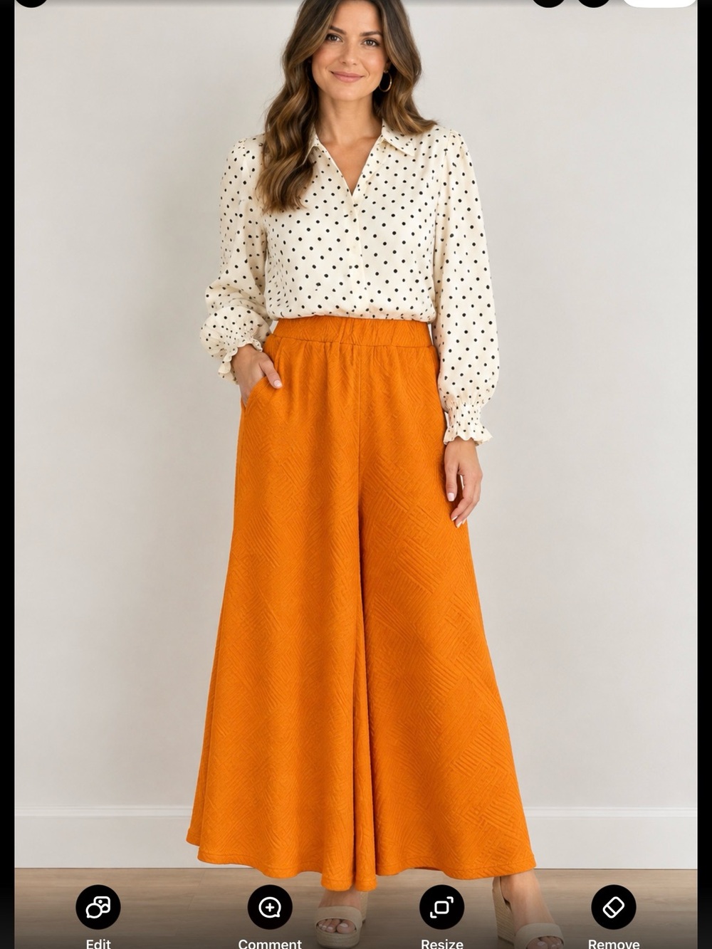 Entro wide-legged orange pants, featuring a relaxed flowy silhouette